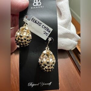 Bansri gold plated drop egg shaped earrings with citrine and black rhinestones.